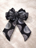 Black and silver brocade fabric bow
